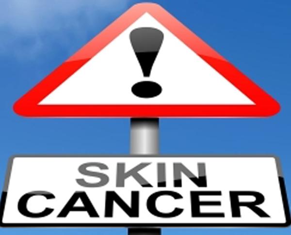 a sign representing skin cancer and the need for regular skin screenings for early detection